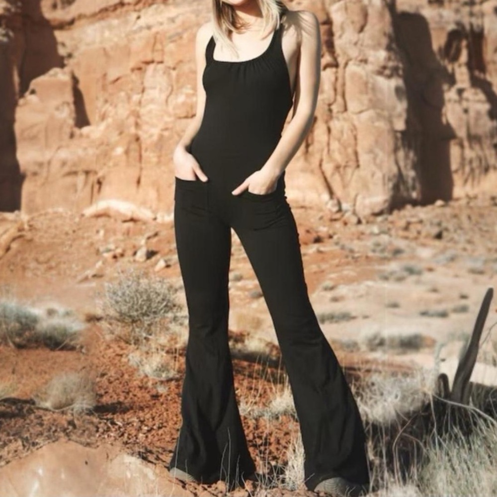 Warrior within black flare jumpsuit
